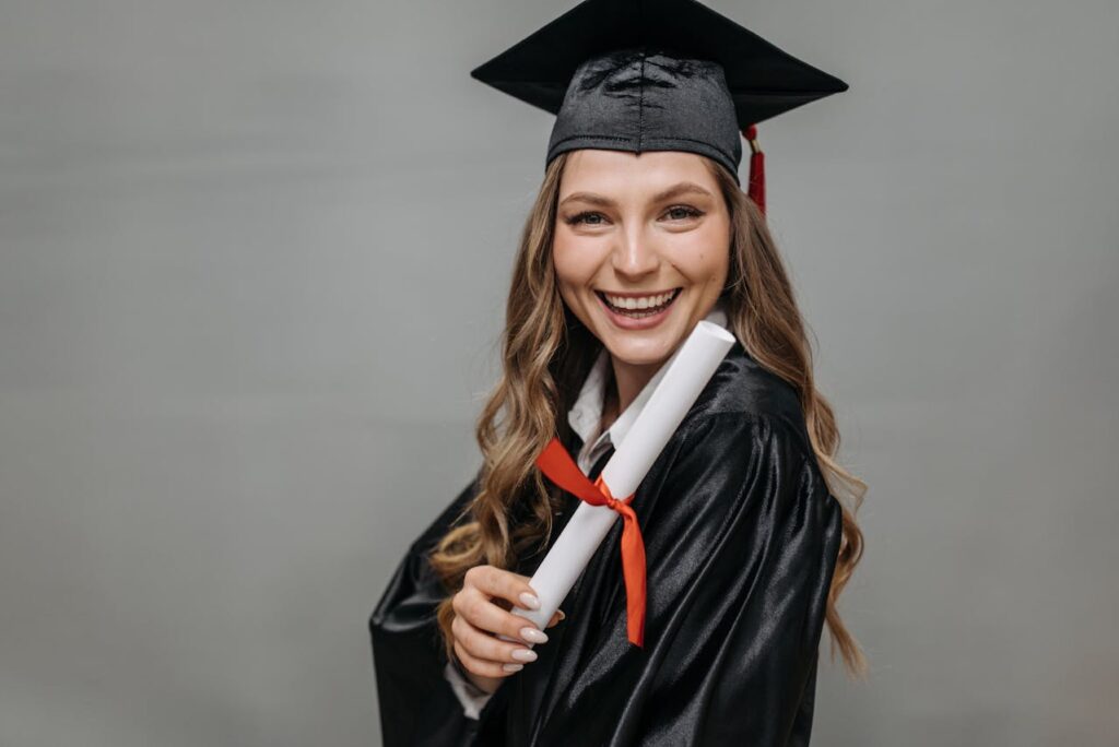 Happy Woman Holding Diploma