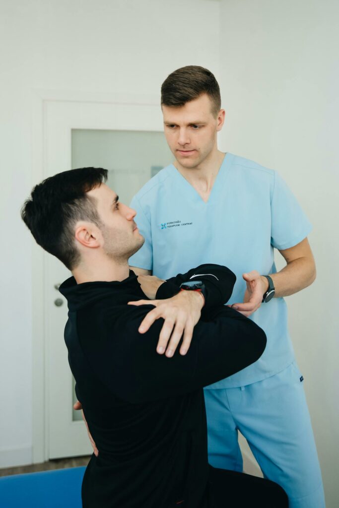 Man Exercising with Physiotherapist