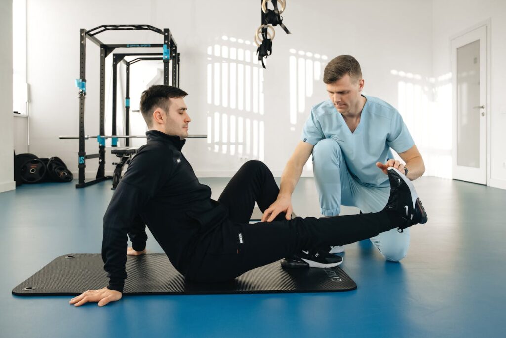 Physiotherapist Practicing with Patient