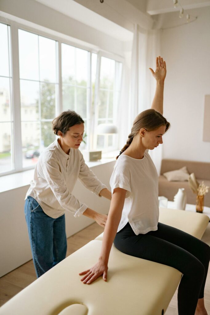 Physiotherapy Treatment - A Woman Having a Back Massage